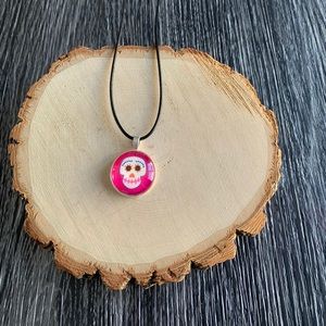 Coco handmade necklace with pink background